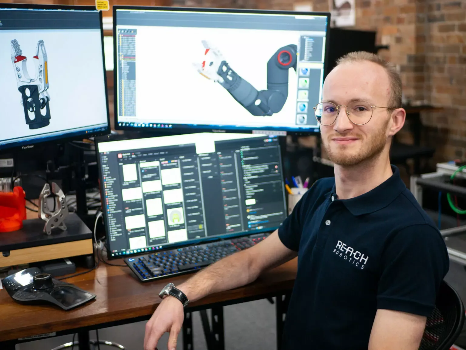 Jean-Eudes Norlain working on design iterations of the Bravo Cutter at Reach Robotics.