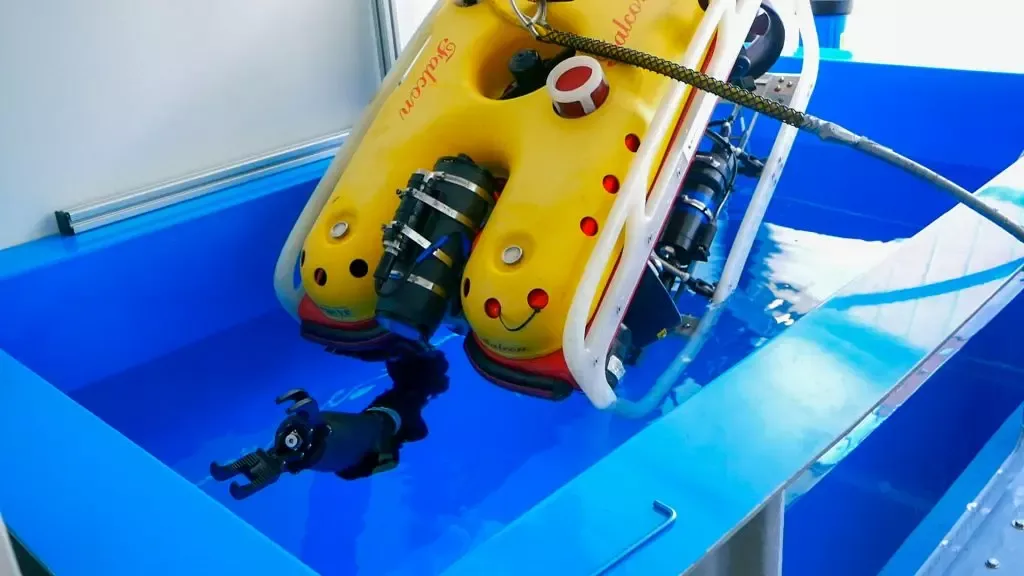 The Reach Bravo integrated with the Saab Seaeye Falcon, taking the first dive in Reach Roboticss in-house test tank.