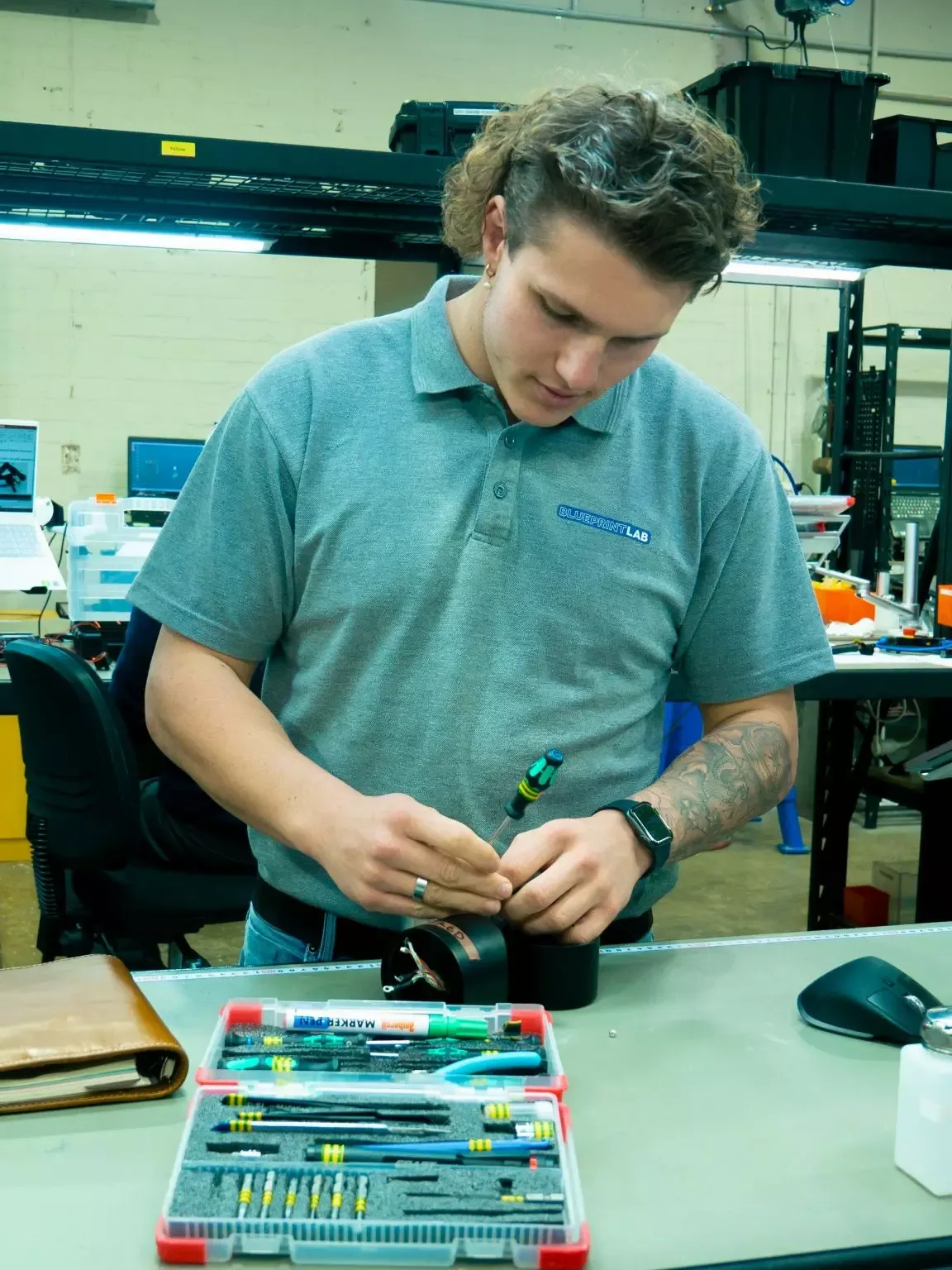 Harley getting hands-on experience in the Reach Robotics Production Department